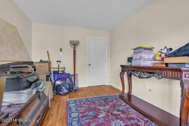 860 Lower Ferry Road, Unit 1K Ewing, NJ 08628 - Photo 36 of 49 a view of a bedroom with baby bed