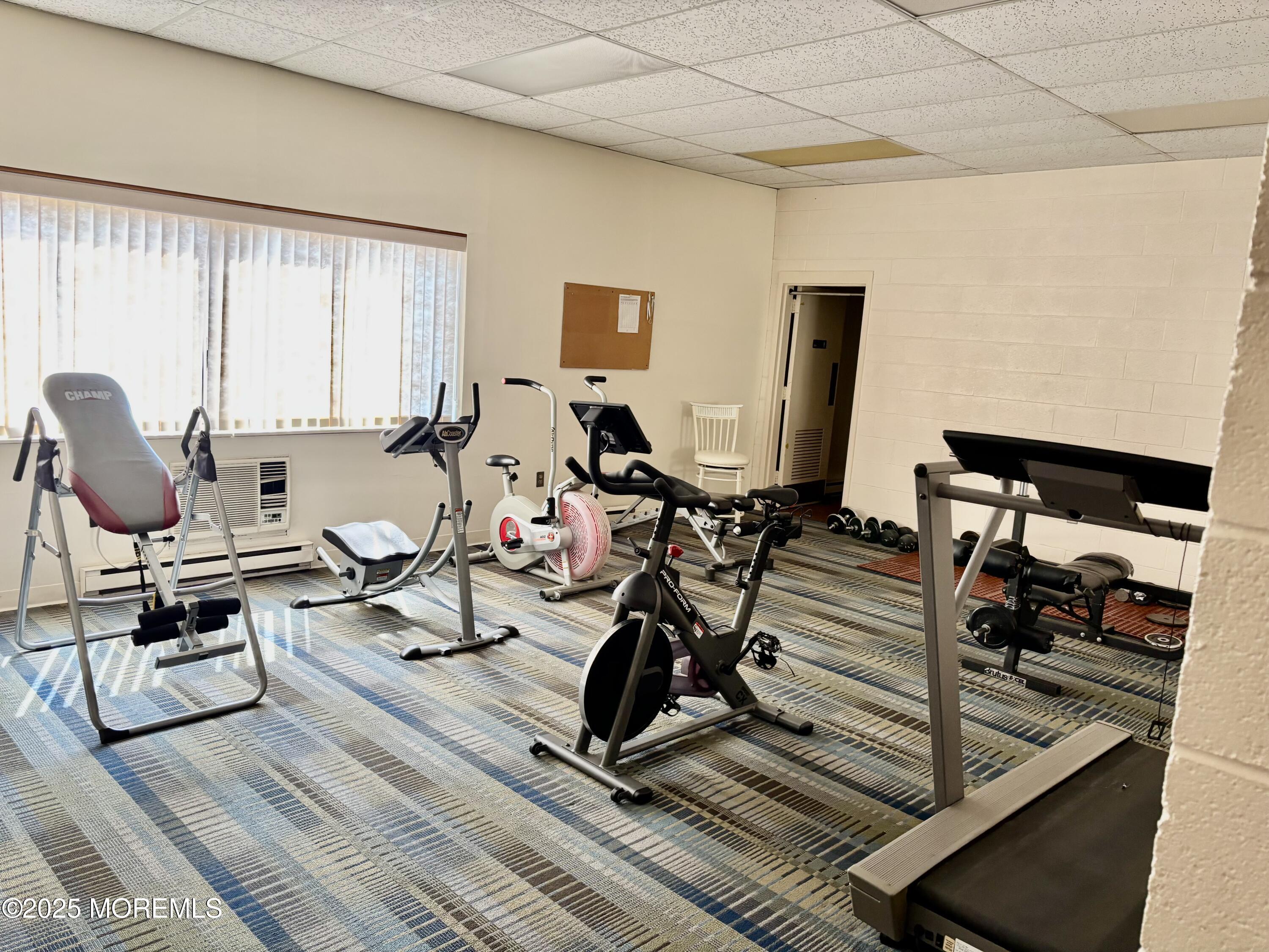 860 Lower Ferry Road, Unit 1K Ewing, NJ 08628 - Photo 39 of 49 a view of a workspace with furniture and a window