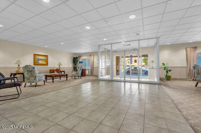 860 Lower Ferry Road, Unit 1K Ewing, NJ 08628 - Photo 4 of 49 a view of a livingroom with furniture and a stove