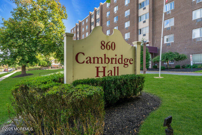 860 Lower Ferry Road, Unit 1K Ewing, NJ 08628 - Photo 49 of 49 a sign on the side of the road