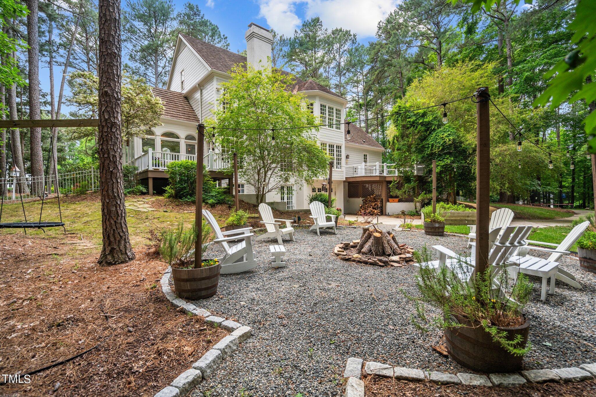 1032 Downing Way Court Raleigh, NC 27614 - Photo 62 of 73 Firepit with custom drain under the center of it