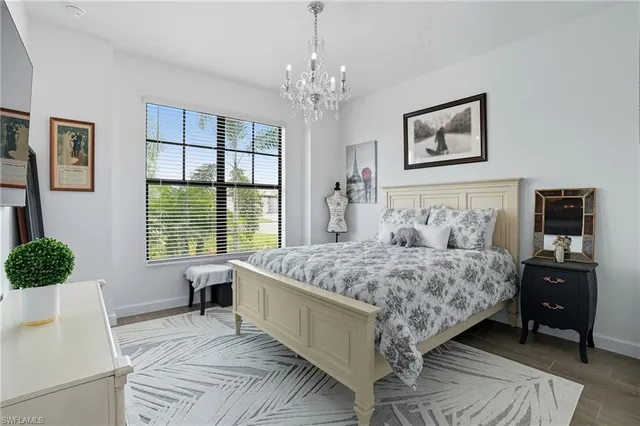 a bathroom with a double vanity sink mirror and shower