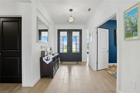 a view of a livingroom with furniture and windows