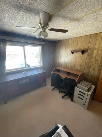 a room with furniture and a window