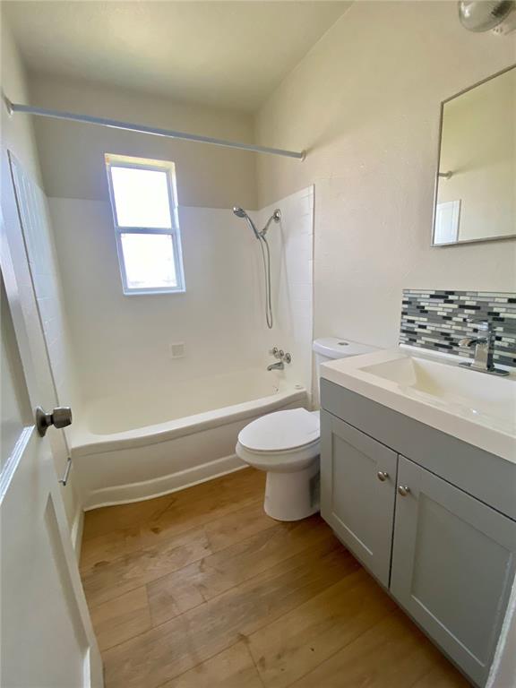 3722 28th Street North, Unit B St. Petersburg, FL 33713 - Photo 8 of 8 a bathroom with a sink toilet and shower