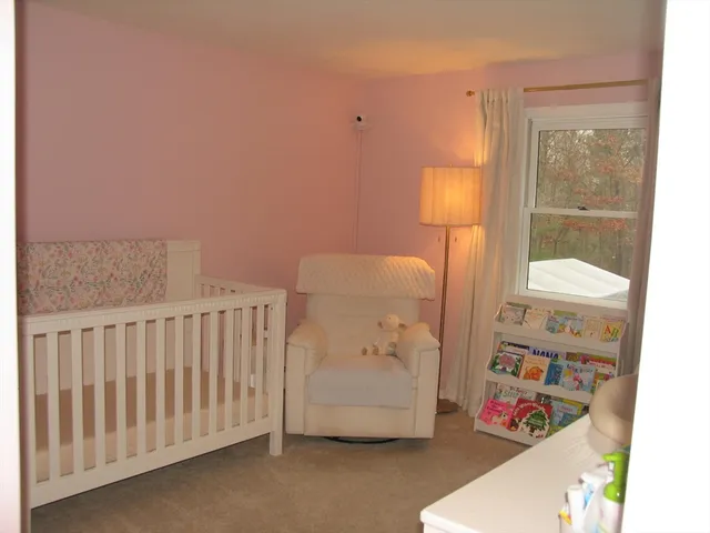 a bathroom with a toilet and a sink