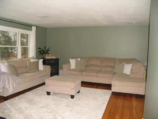 a living room with furniture and a couch