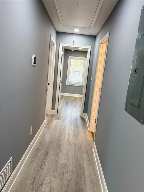 1546 Alverado Way Decatur, GA 30032 - Photo 13 of 17 a view of hallway with wooden floor