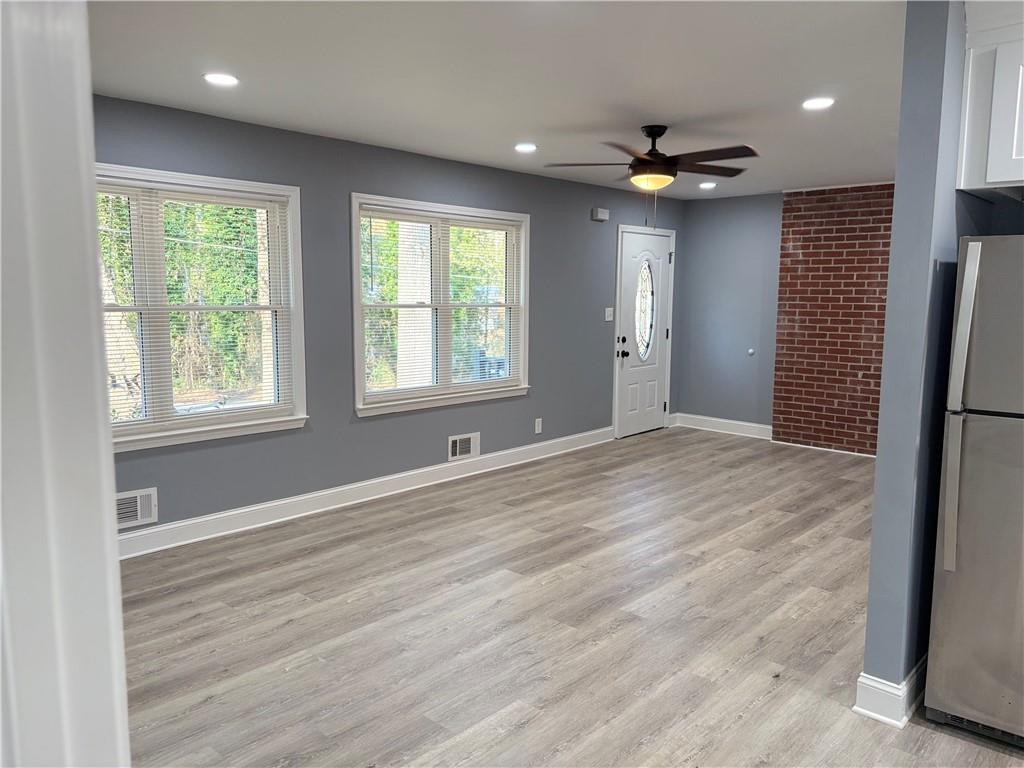 1546 Alverado Way Decatur, GA 30032 - Photo 14 of 17 a view of an empty room with a window