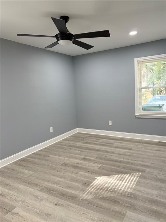 1546 Alverado Way Decatur, GA 30032 - Photo 15 of 17 a view of a room with wooden floor and a window