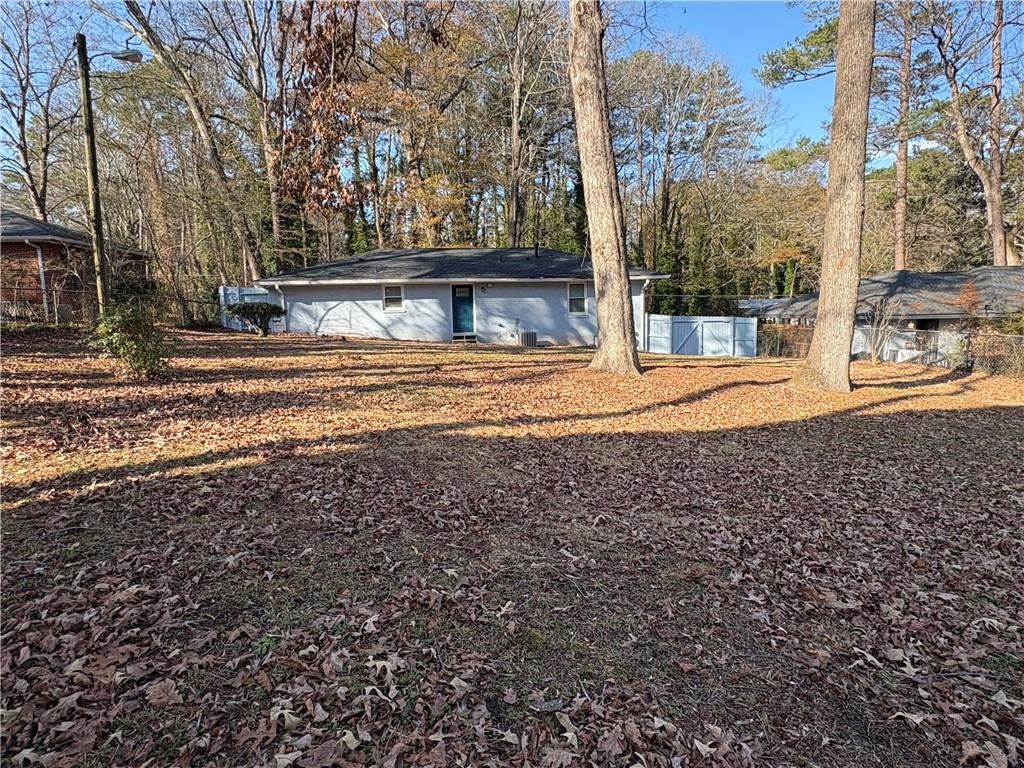 1546 Alverado Way Decatur, GA 30032 - Photo 16 of 17 a view of a house with a yard