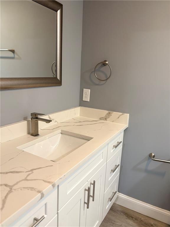 1546 Alverado Way Decatur, GA 30032 - Photo 7 of 17 a bathroom with a sink and a mirror