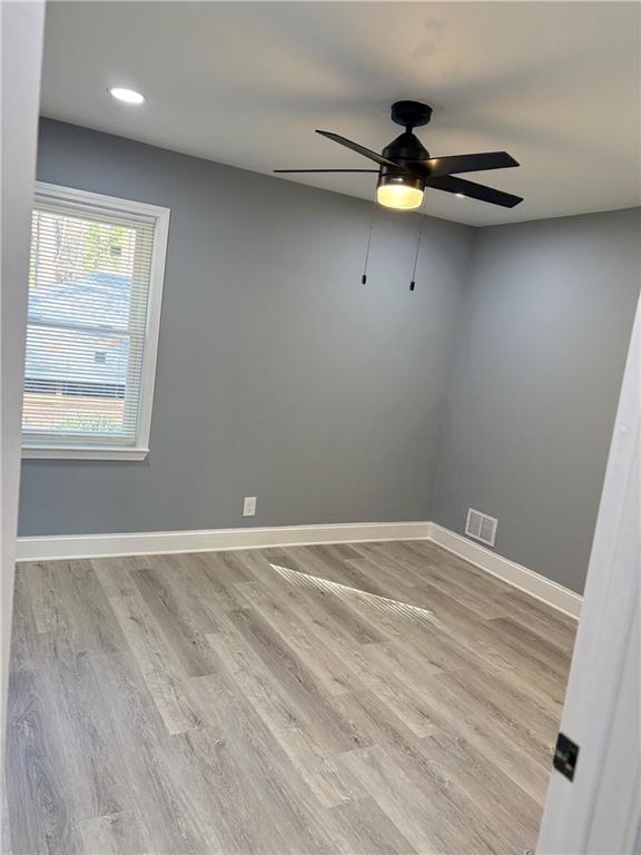 1546 Alverado Way Decatur, GA 30032 - Photo 8 of 17 an empty room with windows