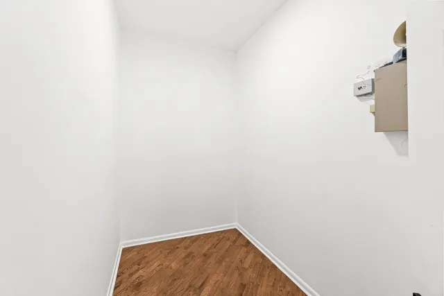 a en suite bathroom with a double vanity sink a mirror and a shower