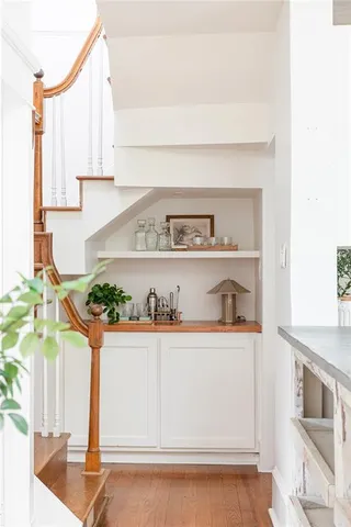 a bedroom with a bed and a fireplace