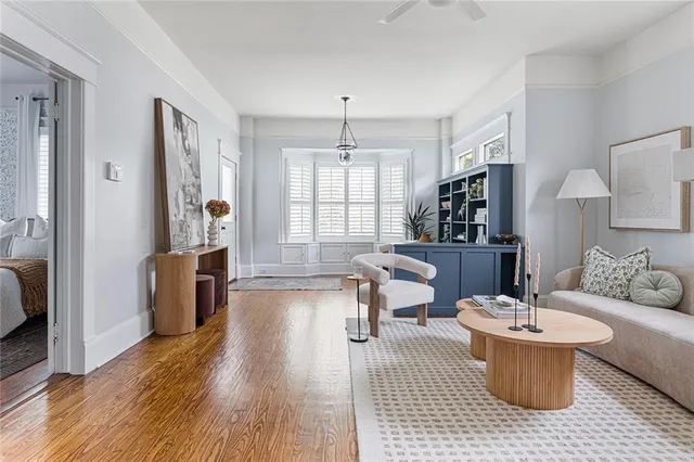 a living room with a fireplace and a fireplace