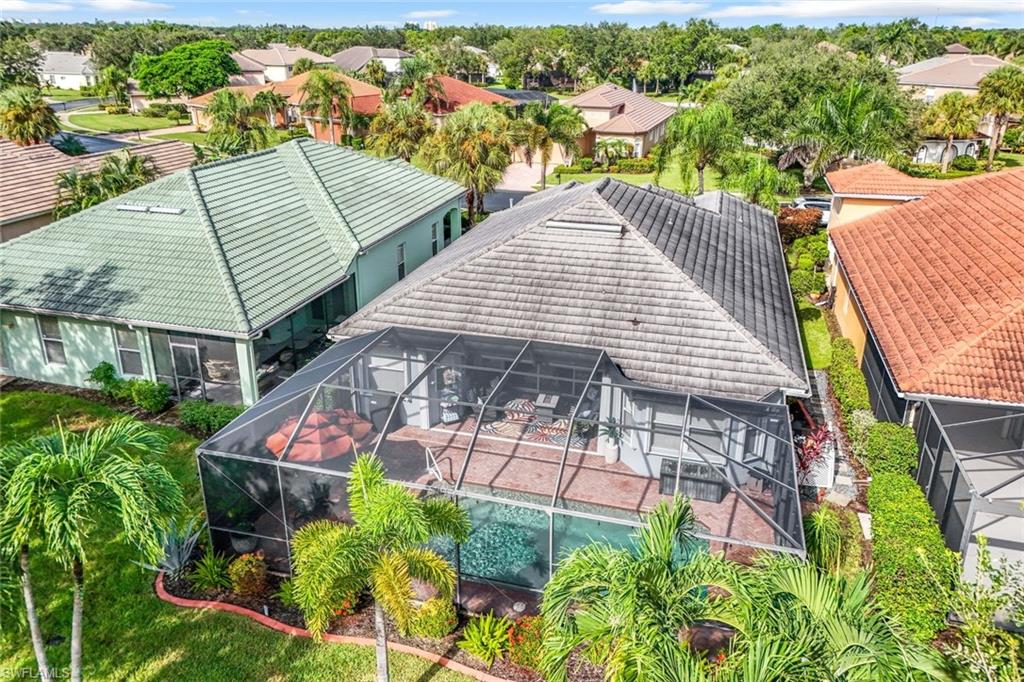 20050 Rookery Drive Estero, FL 33928 - Photo 29 of 45 an aerial view of a house with table and chairs