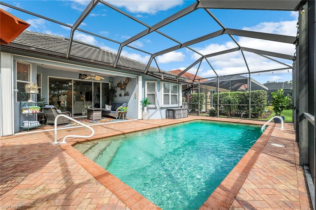 20050 Rookery Drive Estero, FL 33928 - Photo 32 of 45 a view of swimming pool with a patio