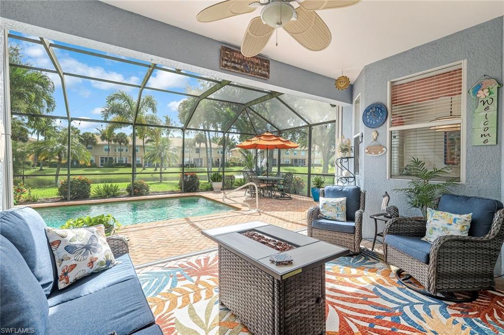20050 Rookery Drive Estero, FL 33928 - Photo 34 of 45 a living room with furniture and a large window