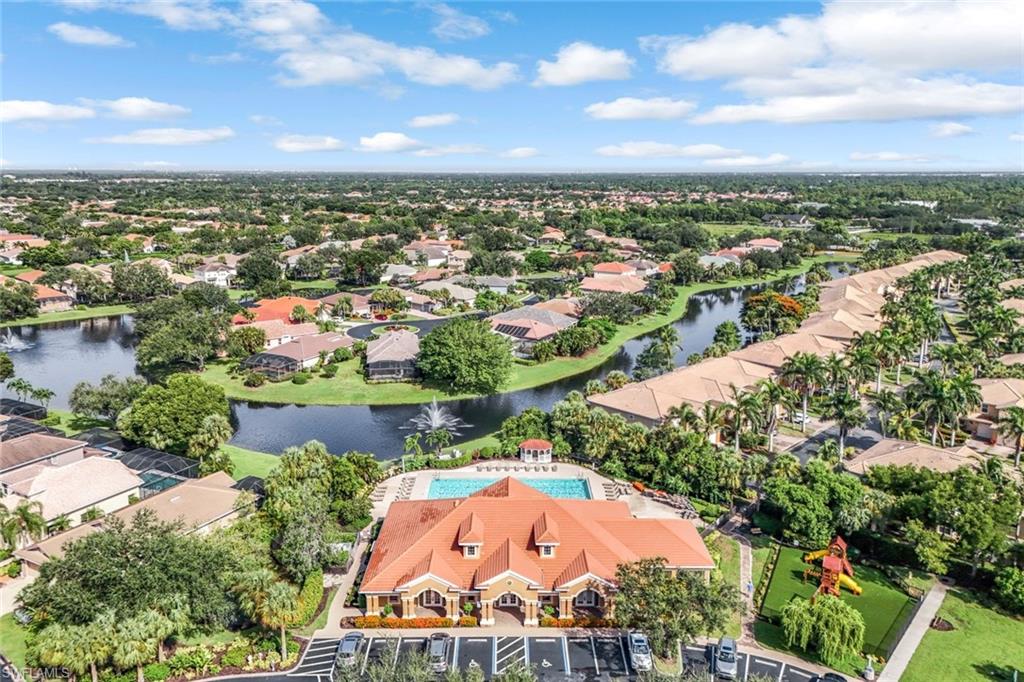 20050 Rookery Drive Estero, FL 33928 - Photo 39 of 45 an aerial view of residential houses with outdoor space and lake view