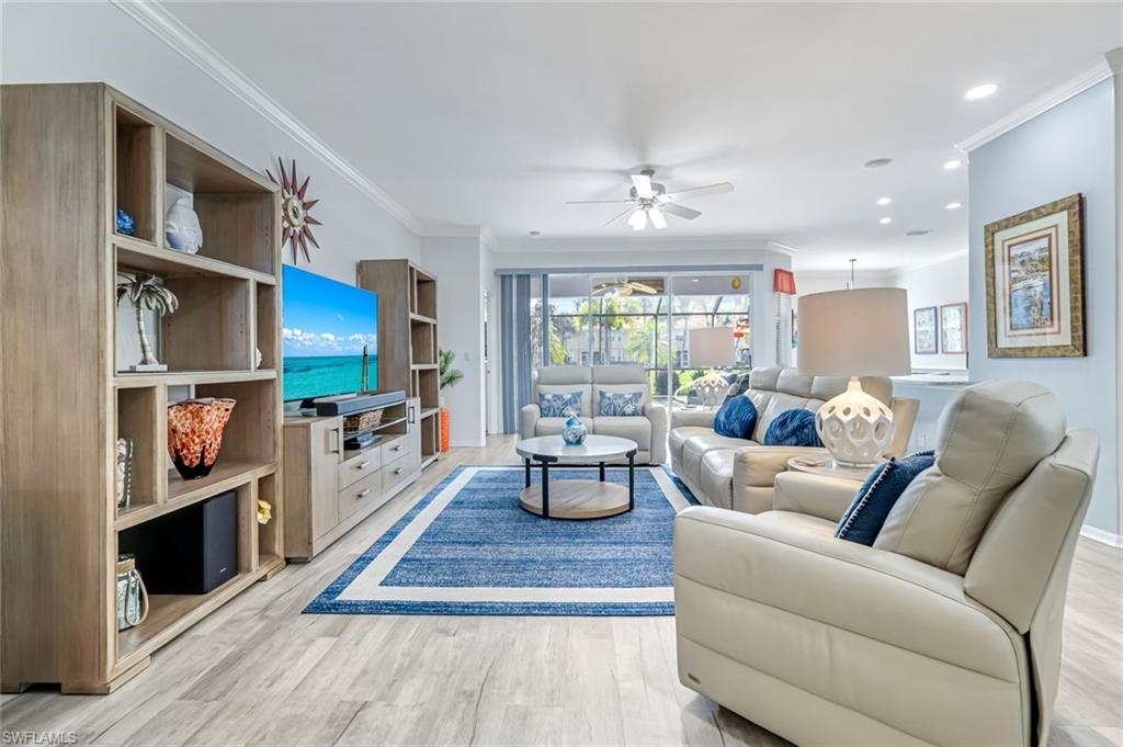 20050 Rookery Drive Estero, FL 33928 - Photo 4 of 45 a living room with furniture fireplace and a window