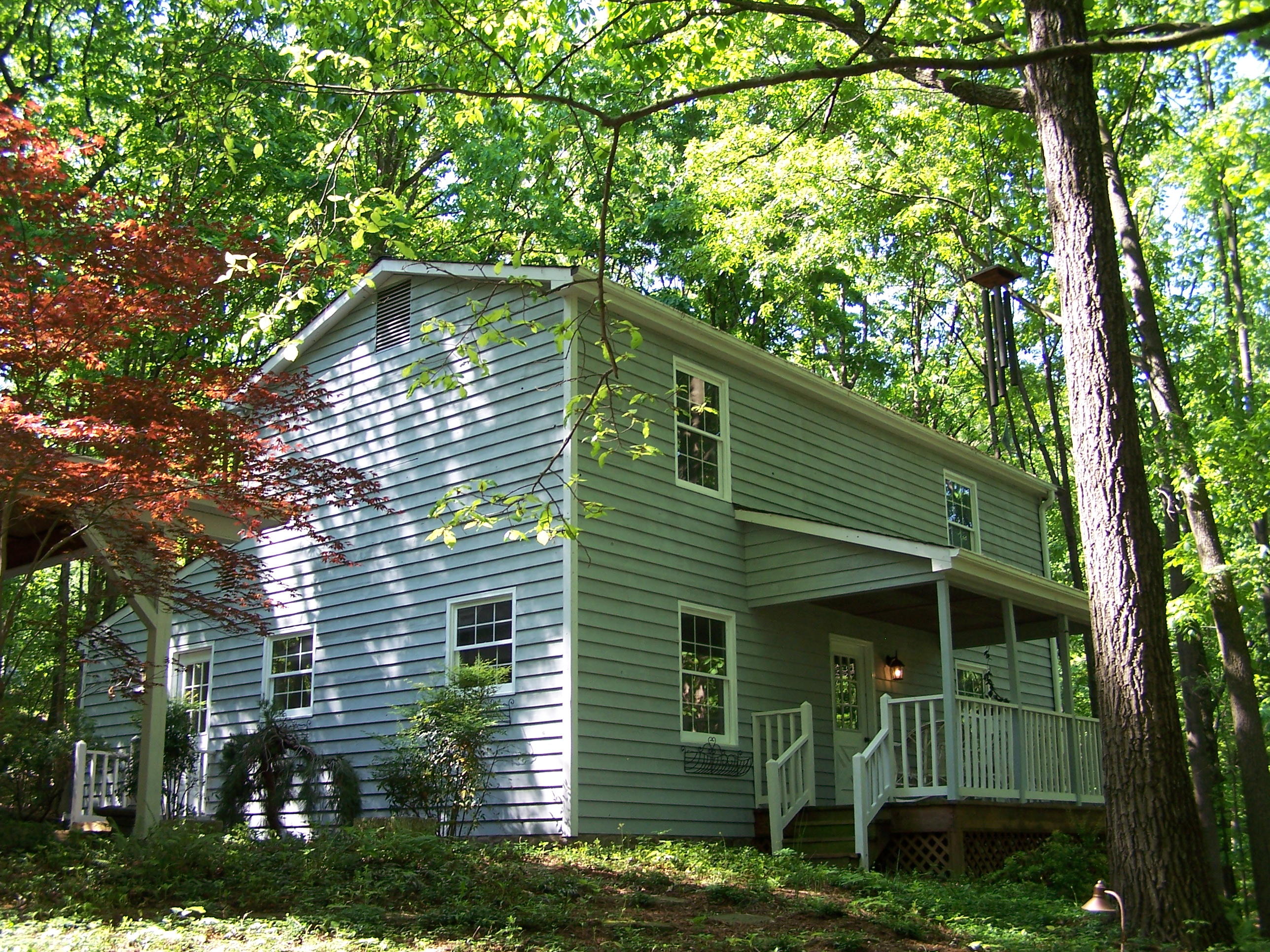 219 W Road Blue Ridge, VA 24064 - Photo 1 of 25 a view of a house with a tree