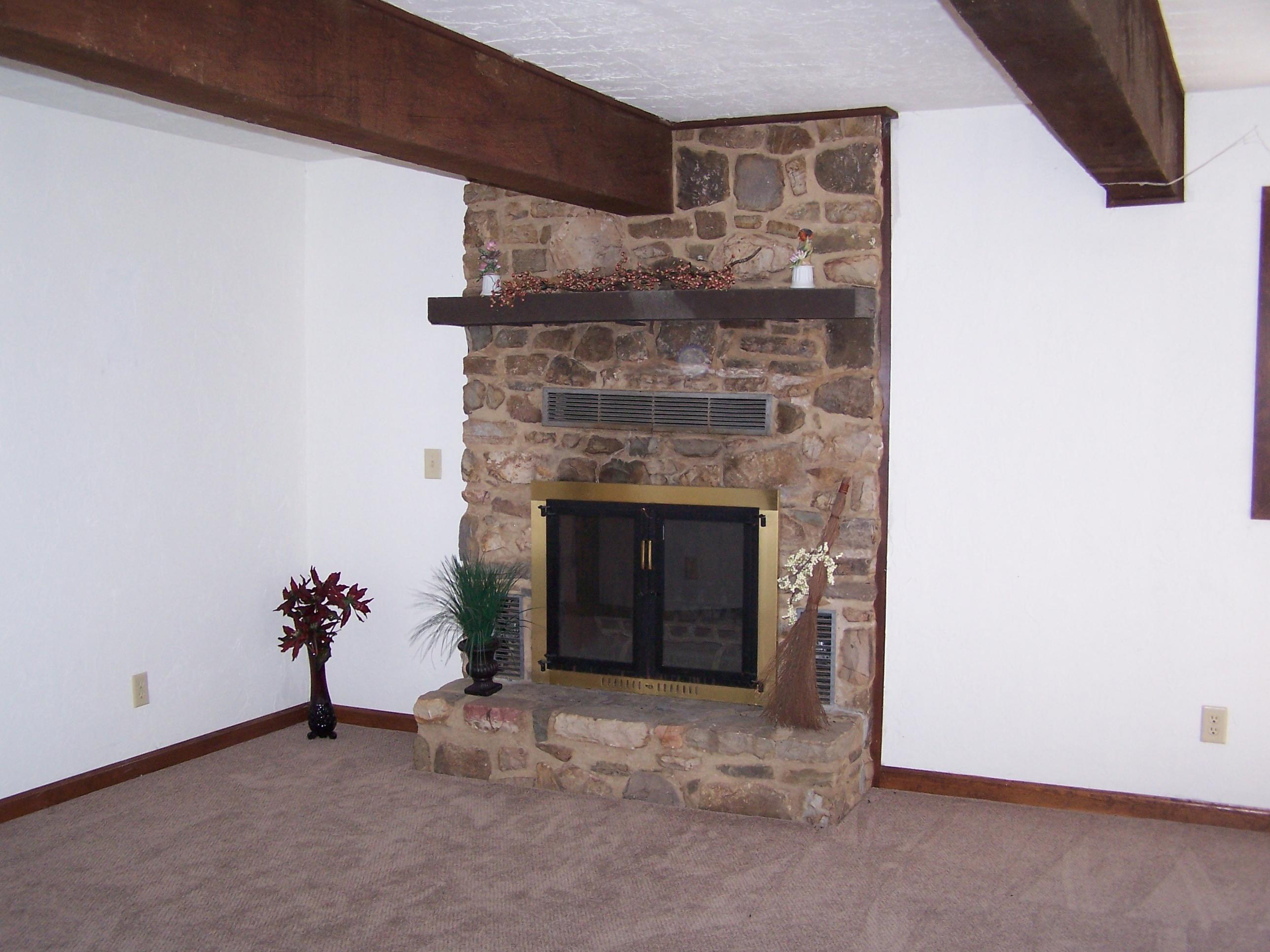 219 W Road Blue Ridge, VA 24064 - Photo 5 of 25 a living room with a fireplace