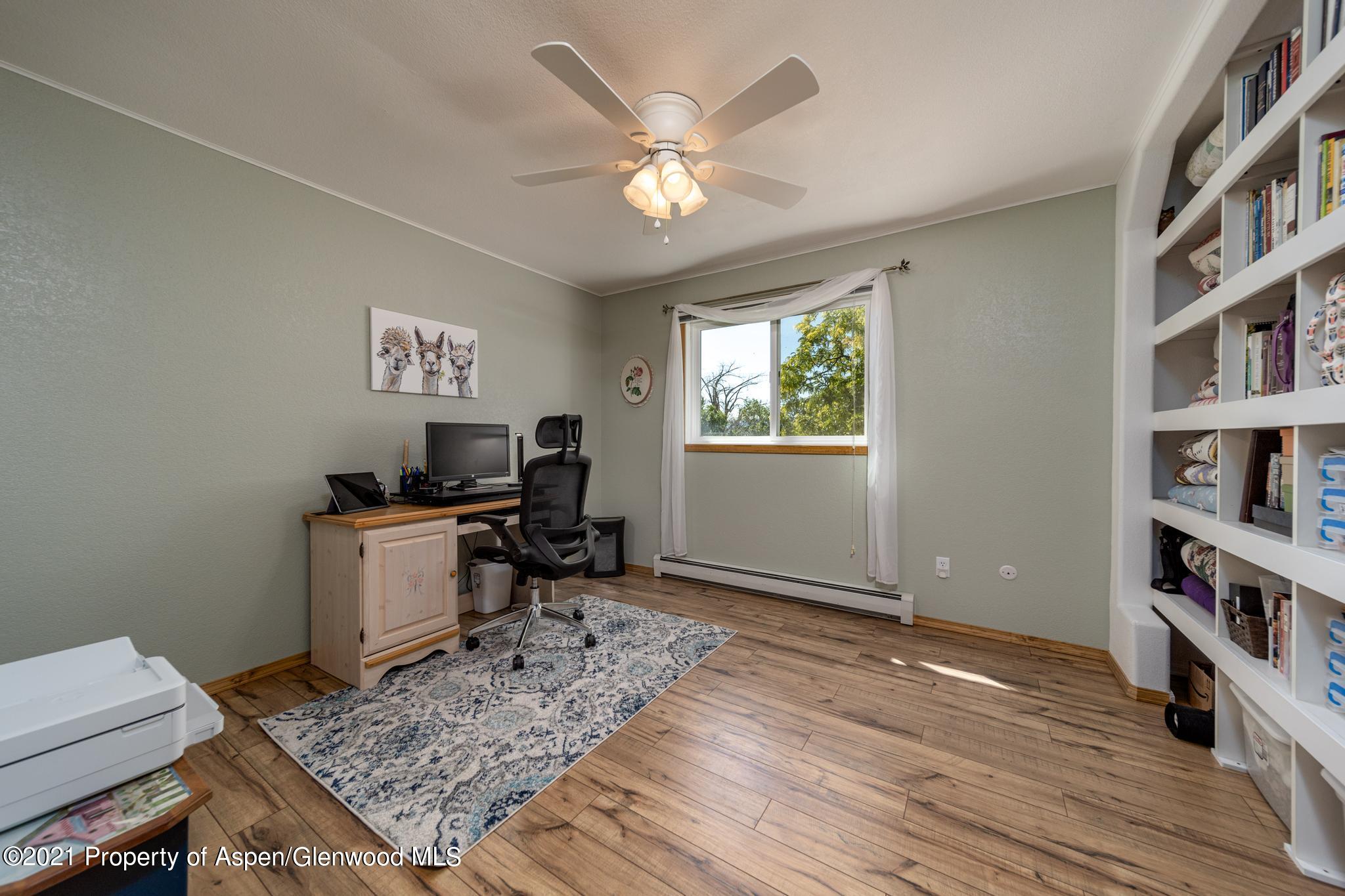 737 Cactus Court Rifle, CO 81650 - Photo 18 of 24 a workspace with furniture and window