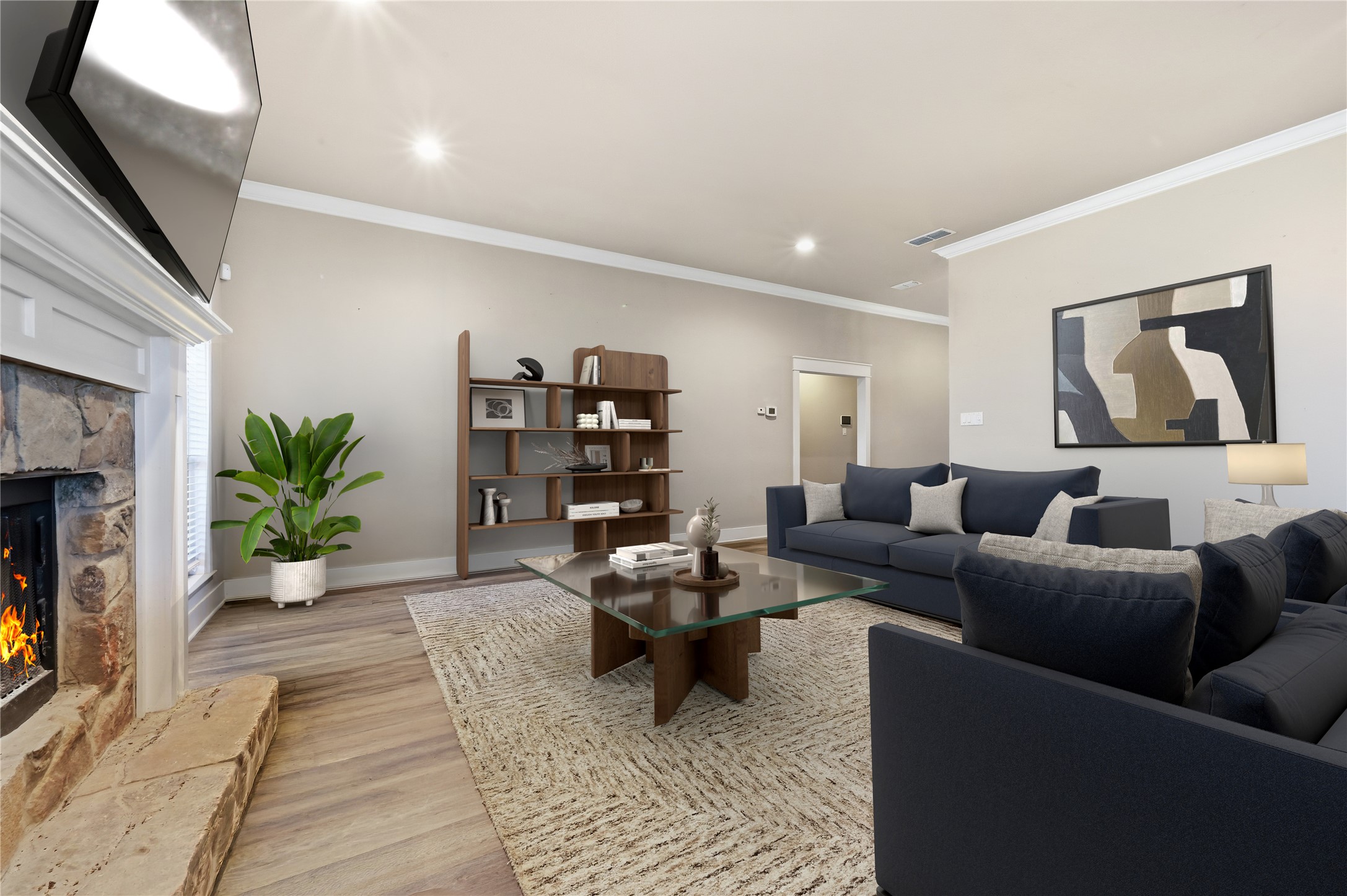4467 West Amity Road Salado, TX 76571 - Photo 12 of 40 The living area features a stone fireplace with a white mantel, light-colored walls, recessed lighting, and crown molding