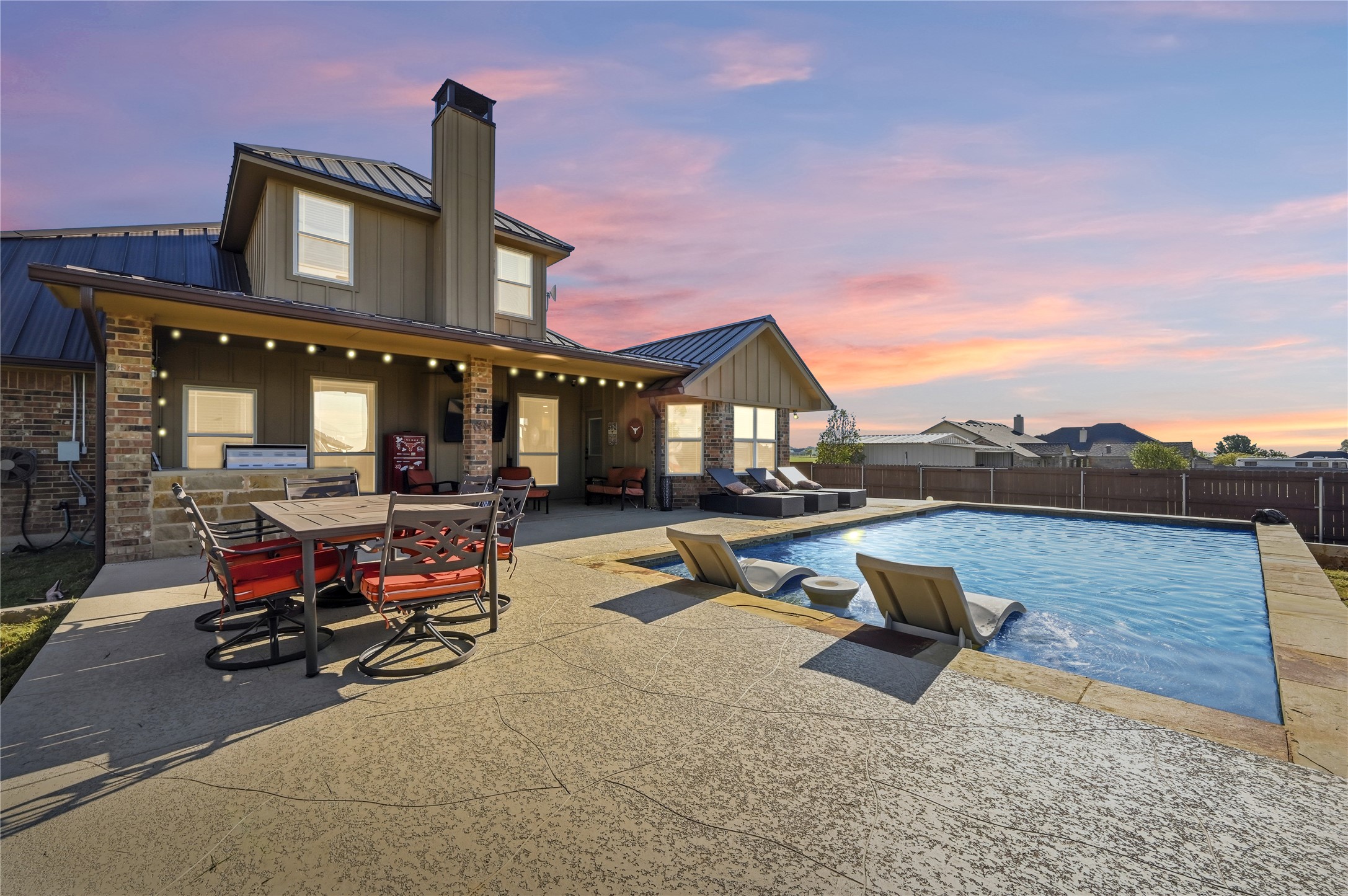 4467 West Amity Road Salado, TX 76571 - Photo 34 of 40 The property features an expansive patio with an inground pool and an outdoor dining area