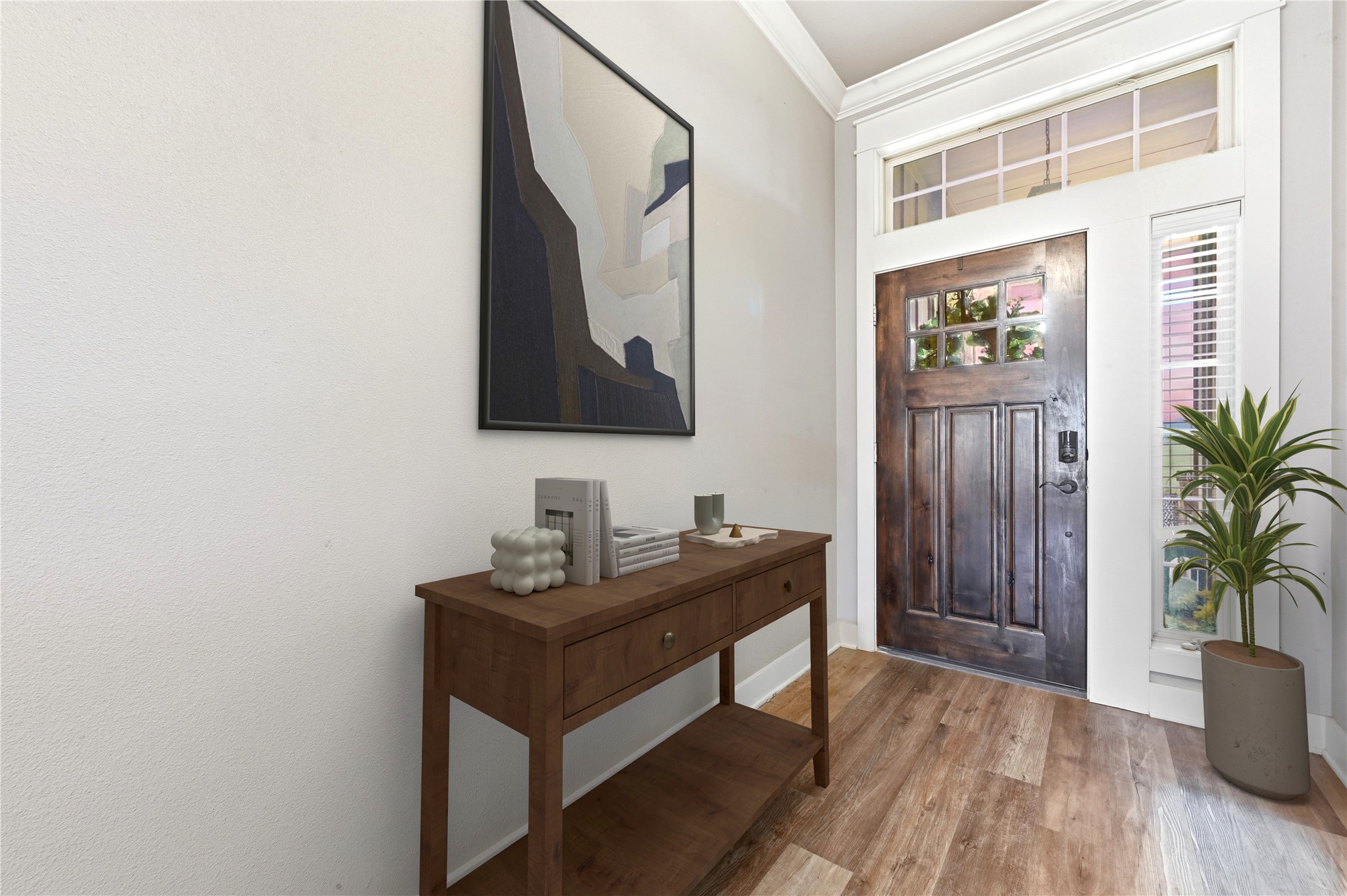4467 West Amity Road Salado, TX 76571 - Photo 8 of 40 Entryway featuring a dark wood door with glass panes, a transom window, and light-colored flooring