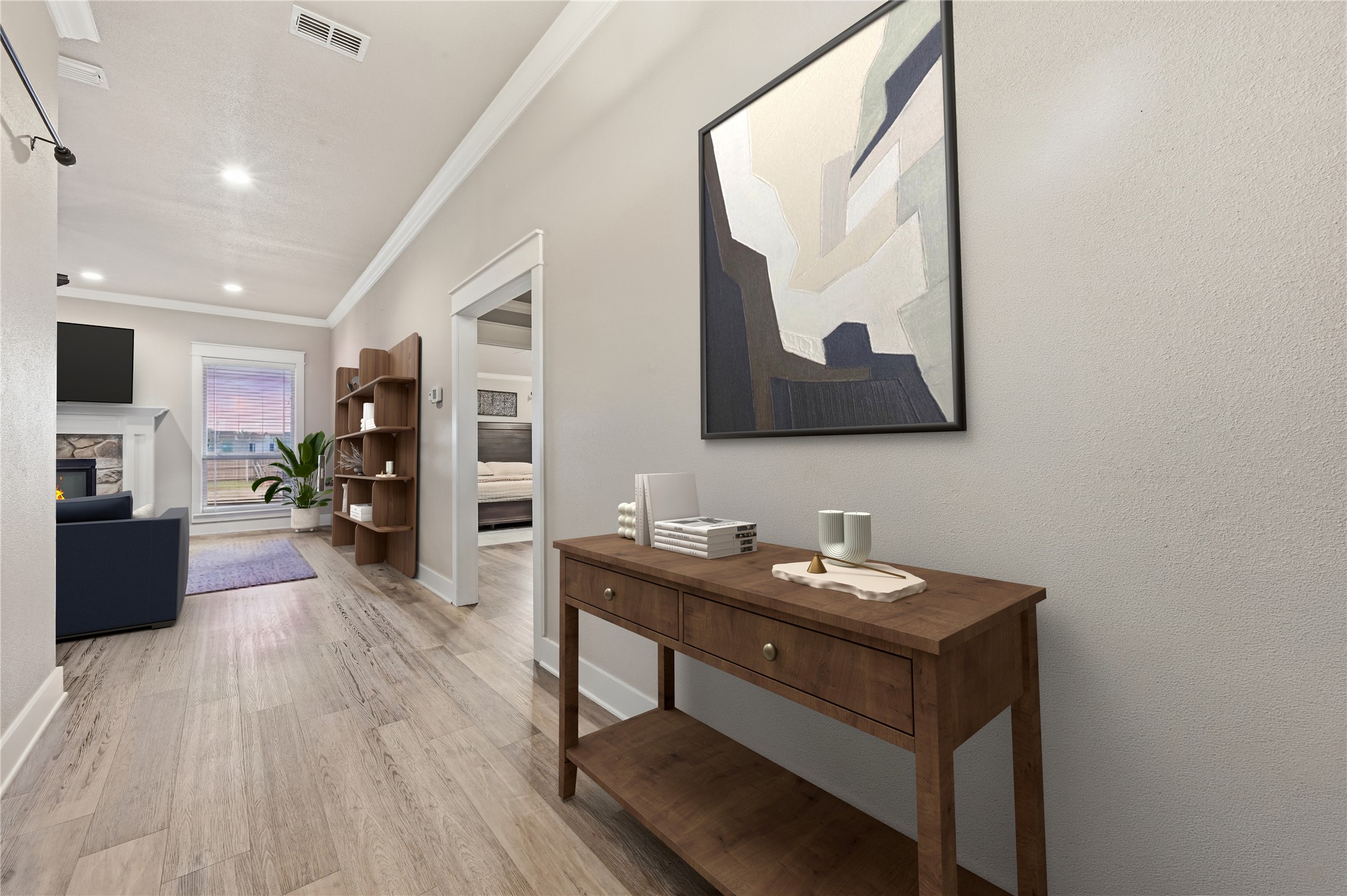 4467 West Amity Road Salado, TX 76571 - Photo 9 of 40 The entryway features a console table and leads to a living space with light-colored flooring, white trim, and a window with blinds