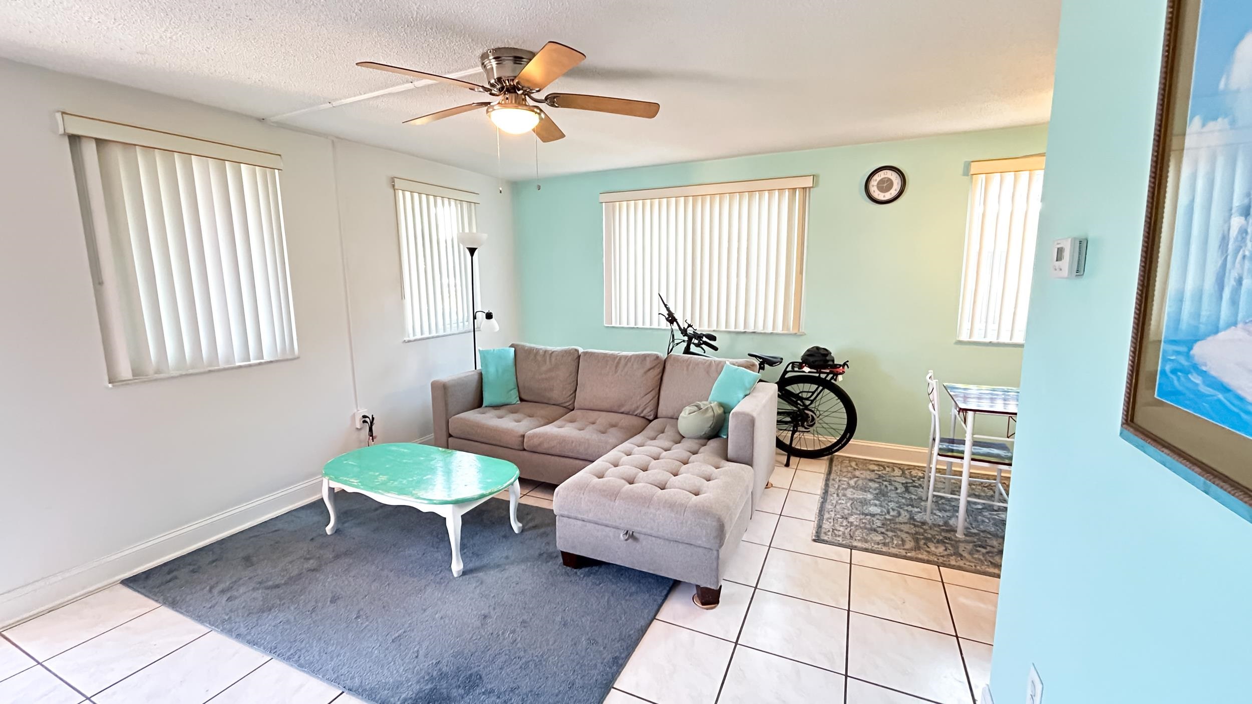 320 3rd Street North Flagler Beach, FL 32136 - Photo 18 of 29 a living room with furniture and a window