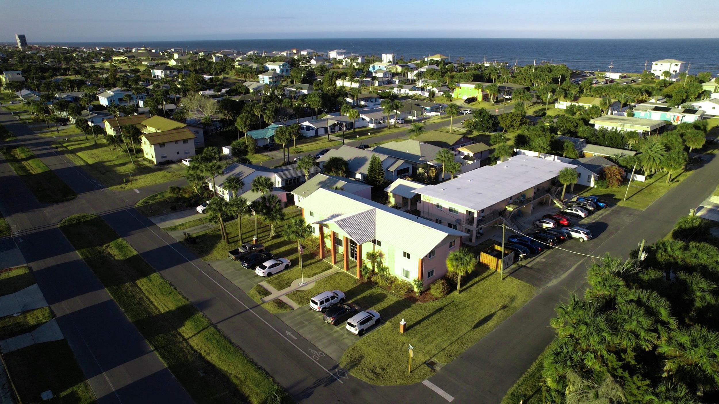 320 3rd Street North Flagler Beach, FL 32136 - Photo 4 of 29 an aerial view of a house with a yard