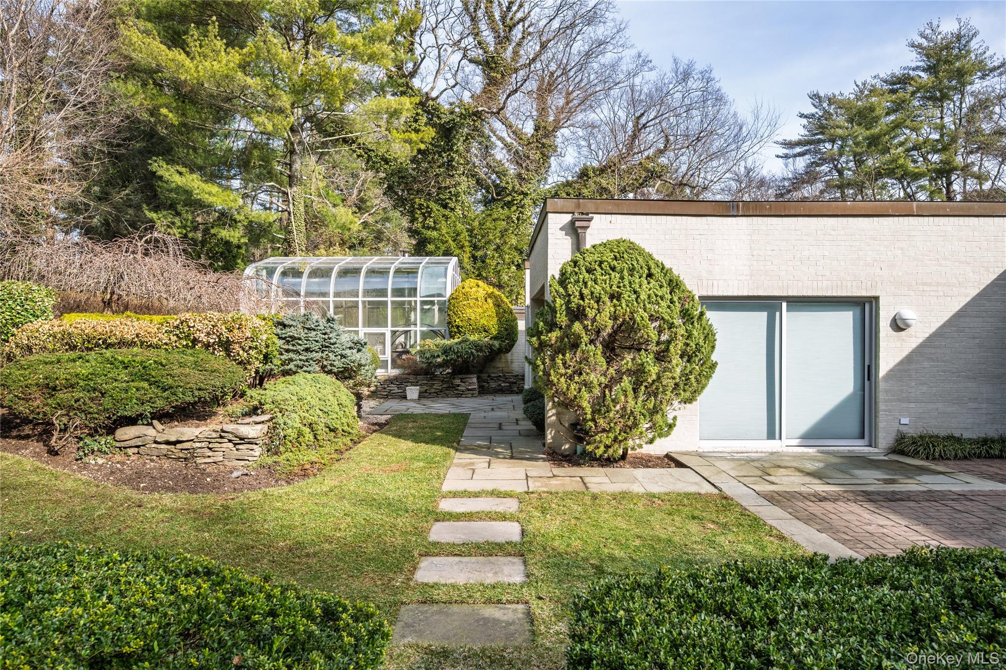 120 Bacon Road Old Westbury, NY 11568 - Photo 25 of 29 a view of a backyard