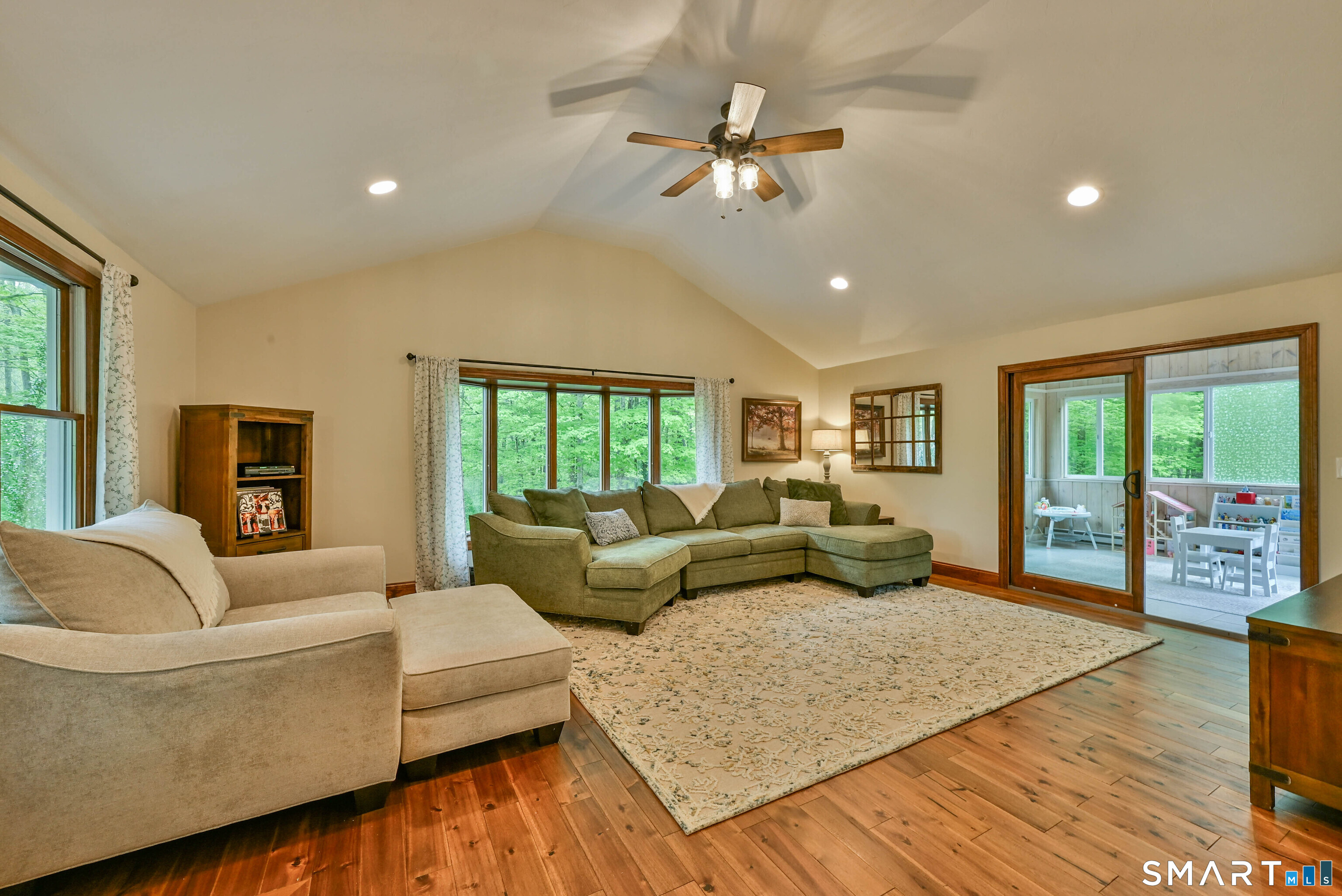 309 O'Leary Road Thompson, CT 06277 - Photo 13 of 40 a living room with furniture and a large window