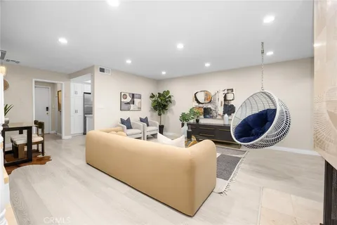 a living room with furniture and a table