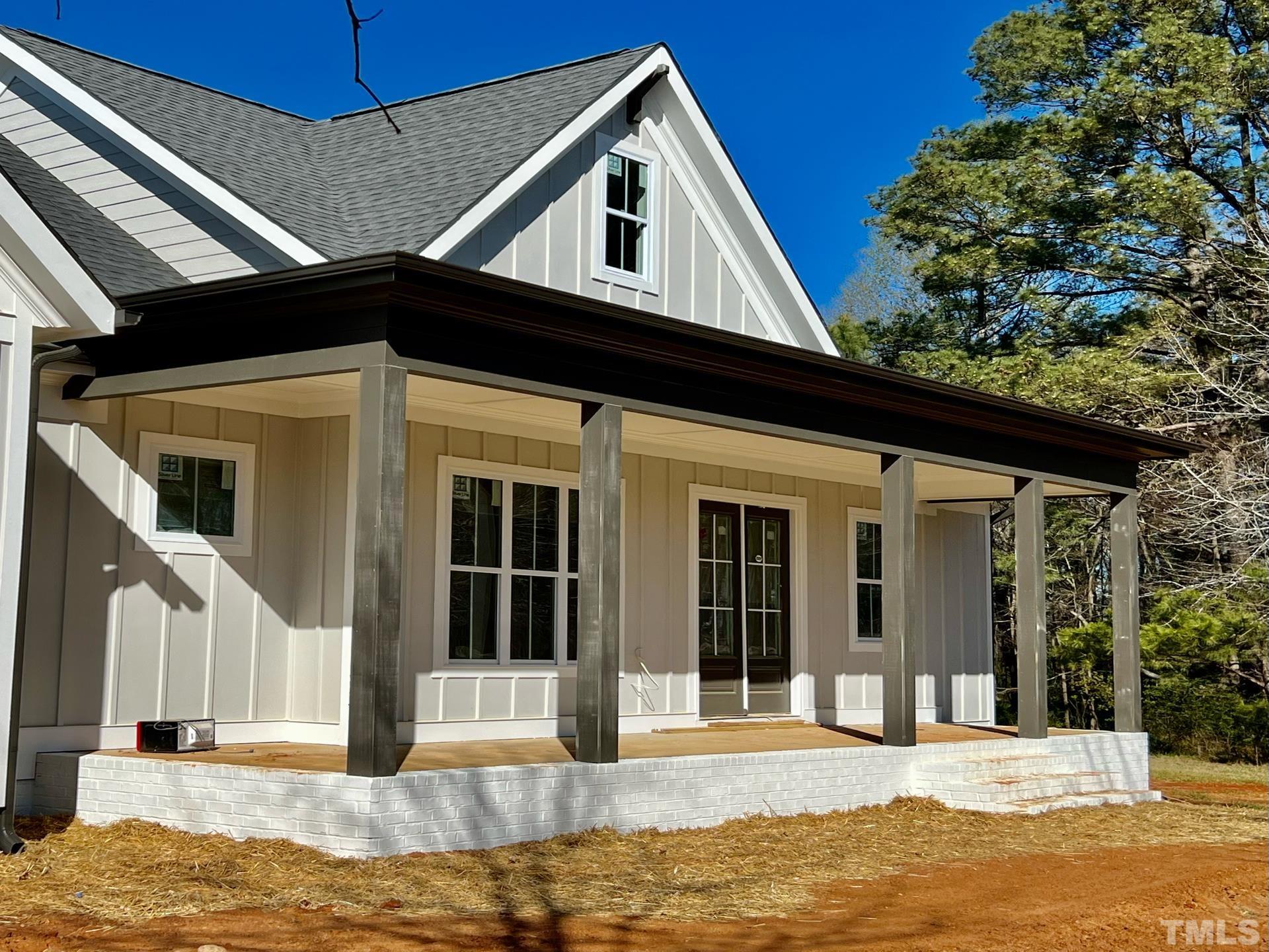 25 Tamaran Ct Spring Spring Hope, NC 27882 - Photo 15 of 40 a view of a house with a swimming pool