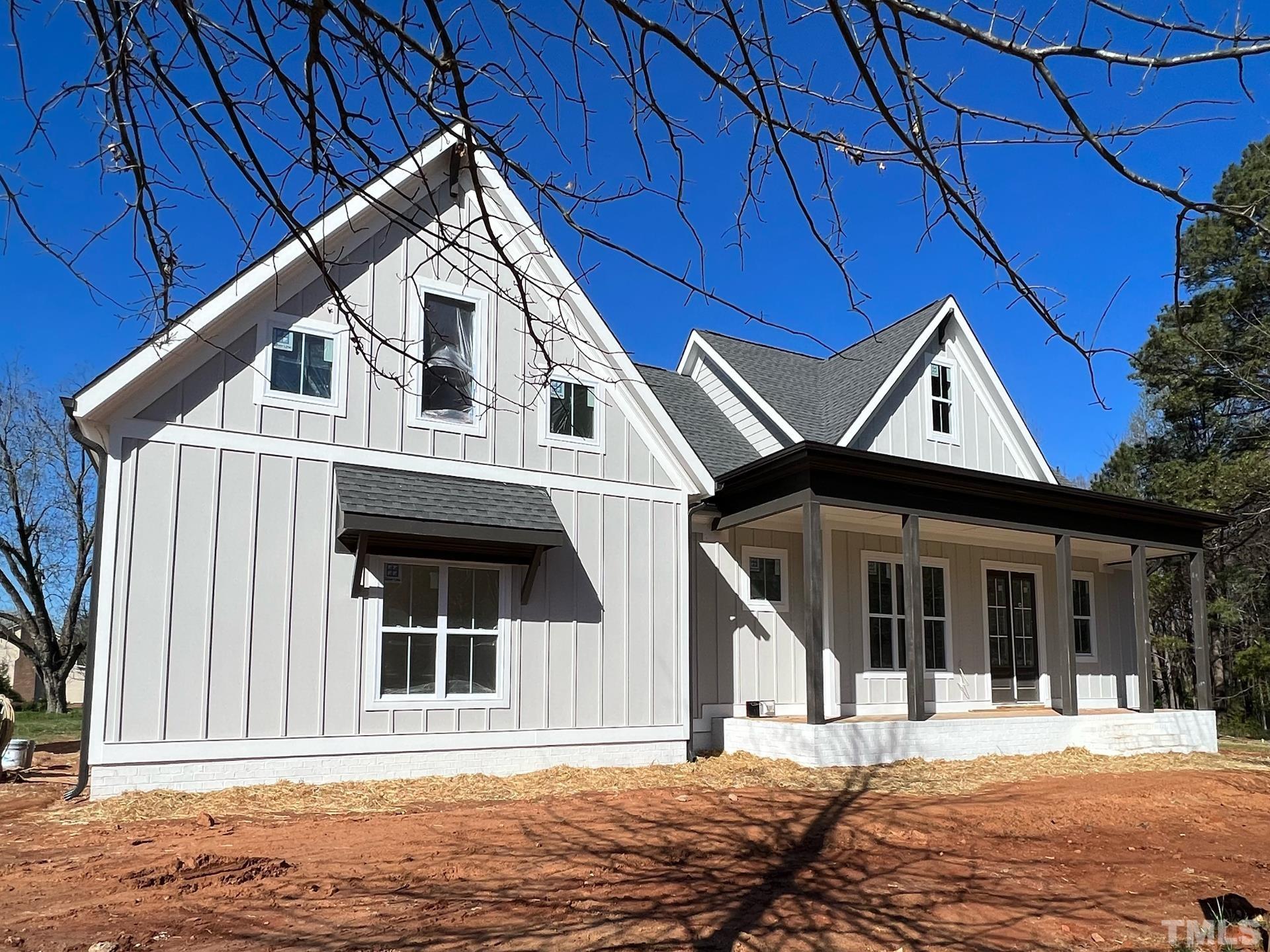 25 Tamaran Ct Spring Spring Hope, NC 27882 - Photo 16 of 40 a front view of a house with a yard