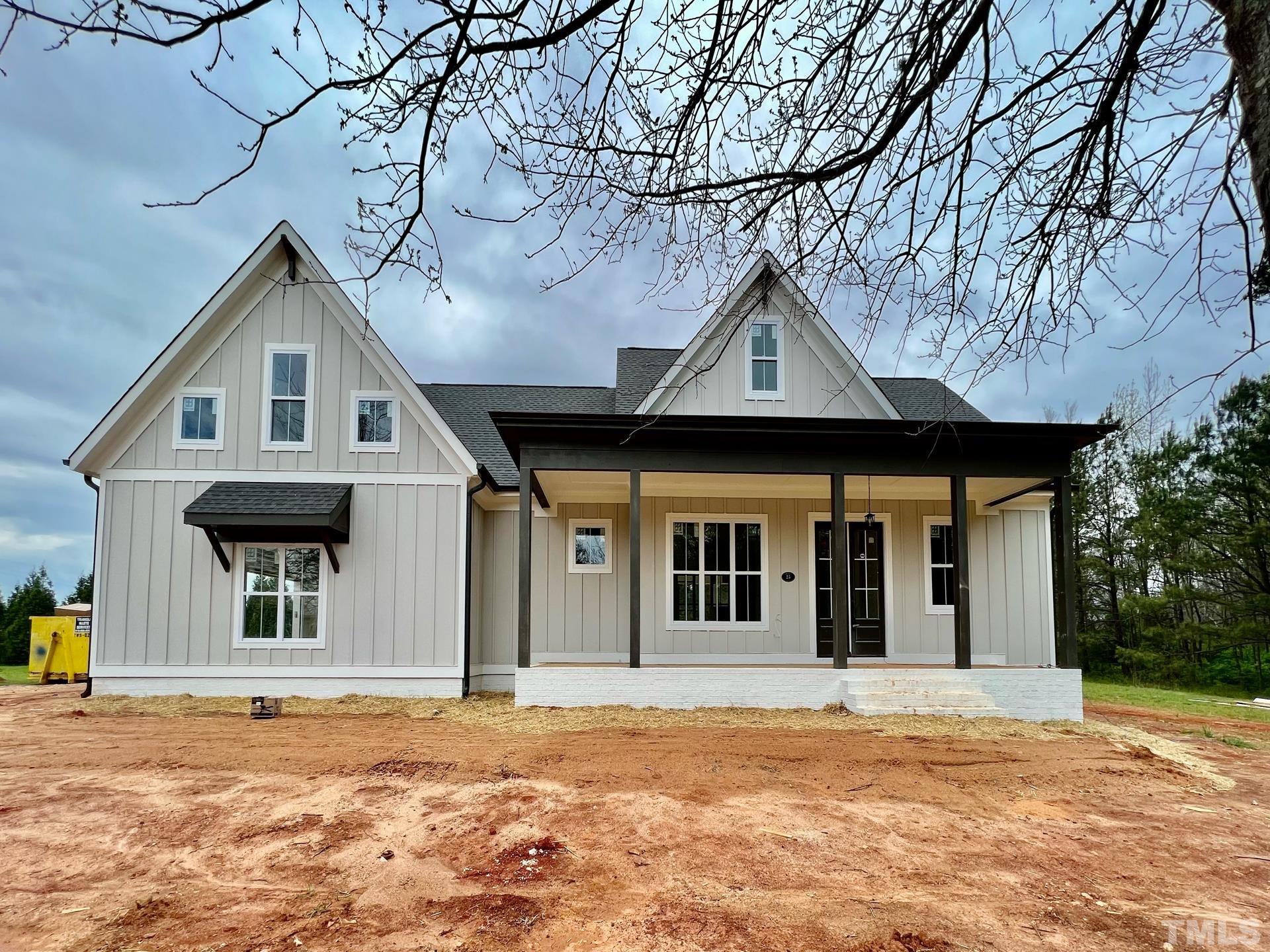 25 Tamaran Ct Spring Spring Hope, NC 27882 - Photo 24 of 40 a front view of a house with a garden