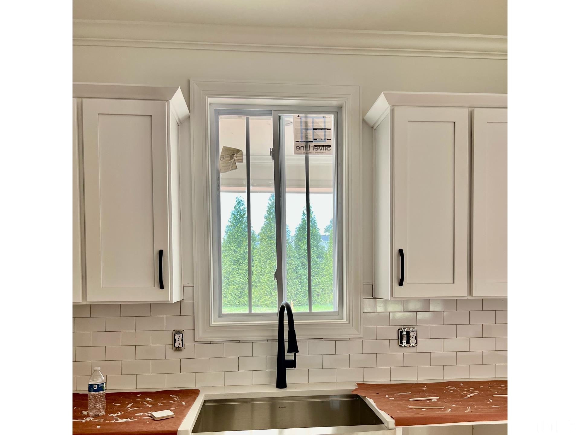 25 Tamaran Ct Spring Spring Hope, NC 27882 - Photo 29 of 40 a bathroom with double vanity and a mirror