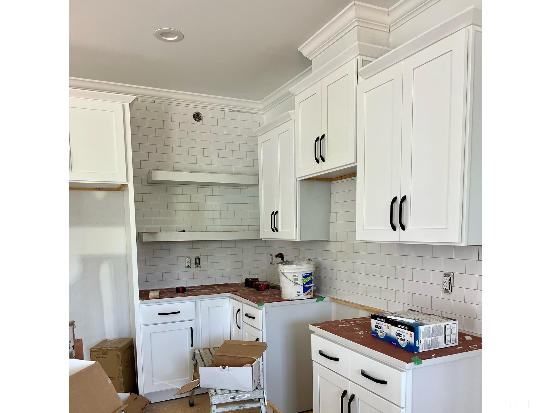 25 Tamaran Ct Spring Spring Hope, NC 27882 - Photo 3 of 40 a kitchen with stainless steel appliances a stove a sink and a refrigerator