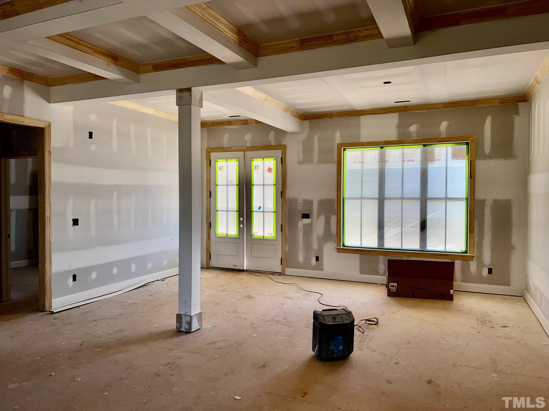 25 Tamaran Ct Spring Spring Hope, NC 27882 - Photo 37 of 40 a living room with a couch and a dresser next to a window