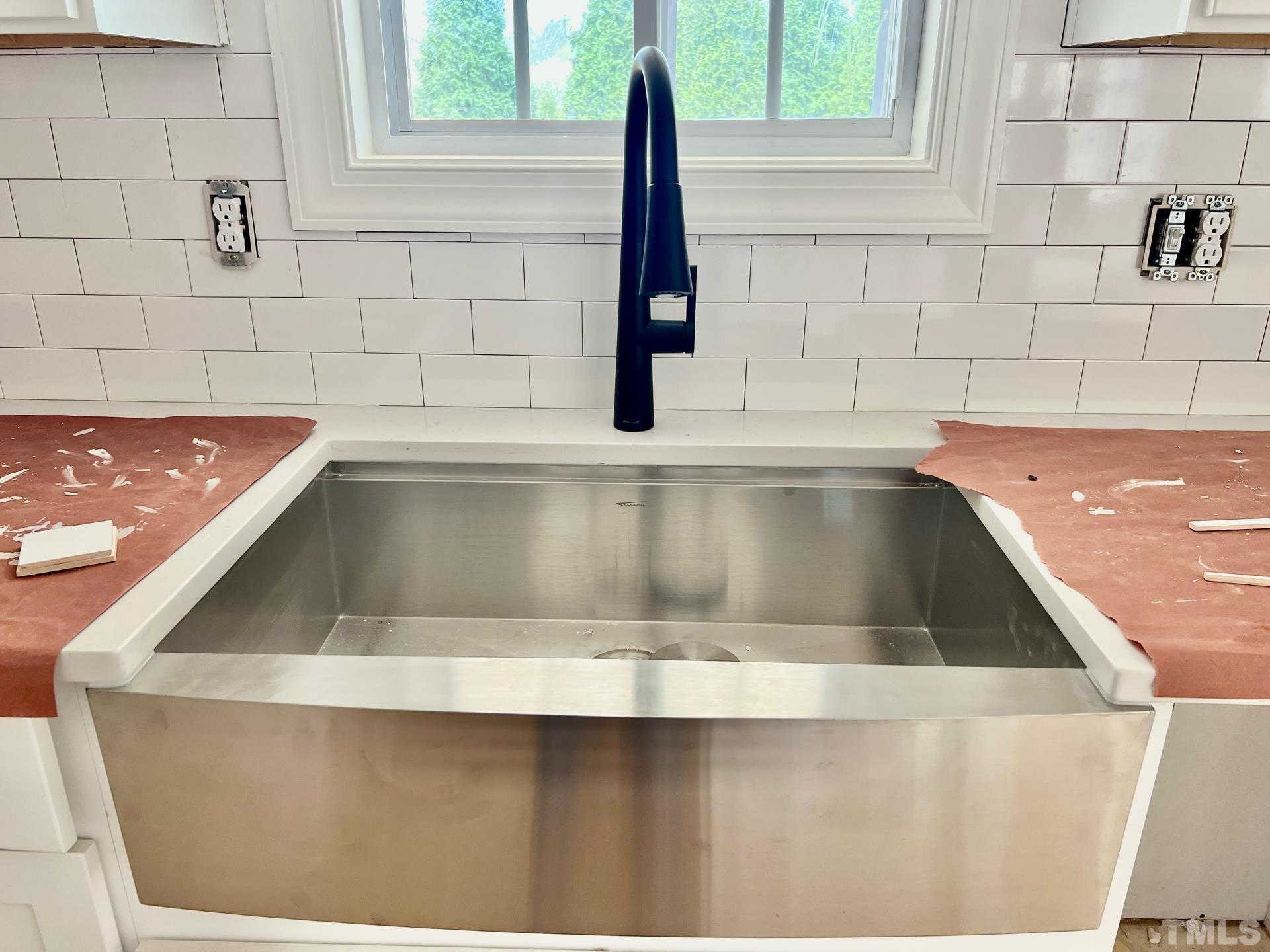 25 Tamaran Ct Spring Spring Hope, NC 27882 - Photo 6 of 40 a view of a kitchen counter space with a sink