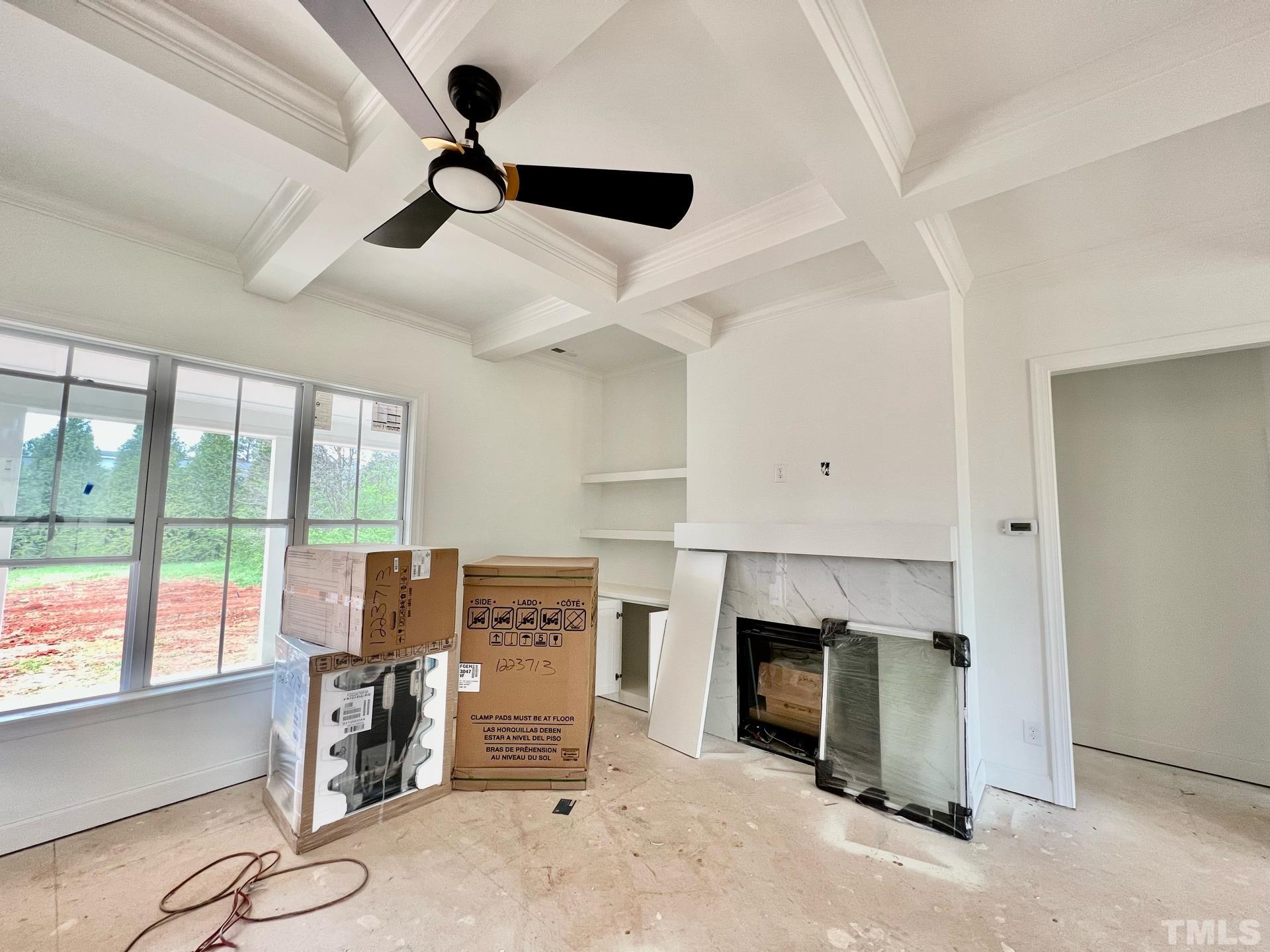 25 Tamaran Ct Spring Spring Hope, NC 27882 - Photo 8 of 40 a living room with furniture and a fireplace