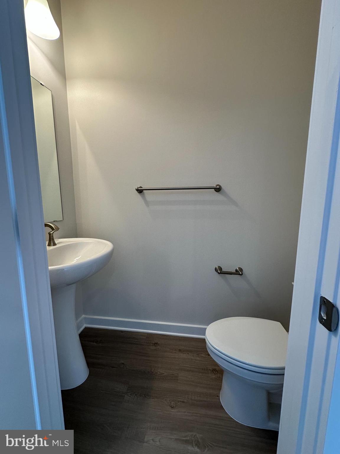 69 Trotting Road Inwood, WV 25428 - Photo 16 of 43 a white toilet sitting next to a sink