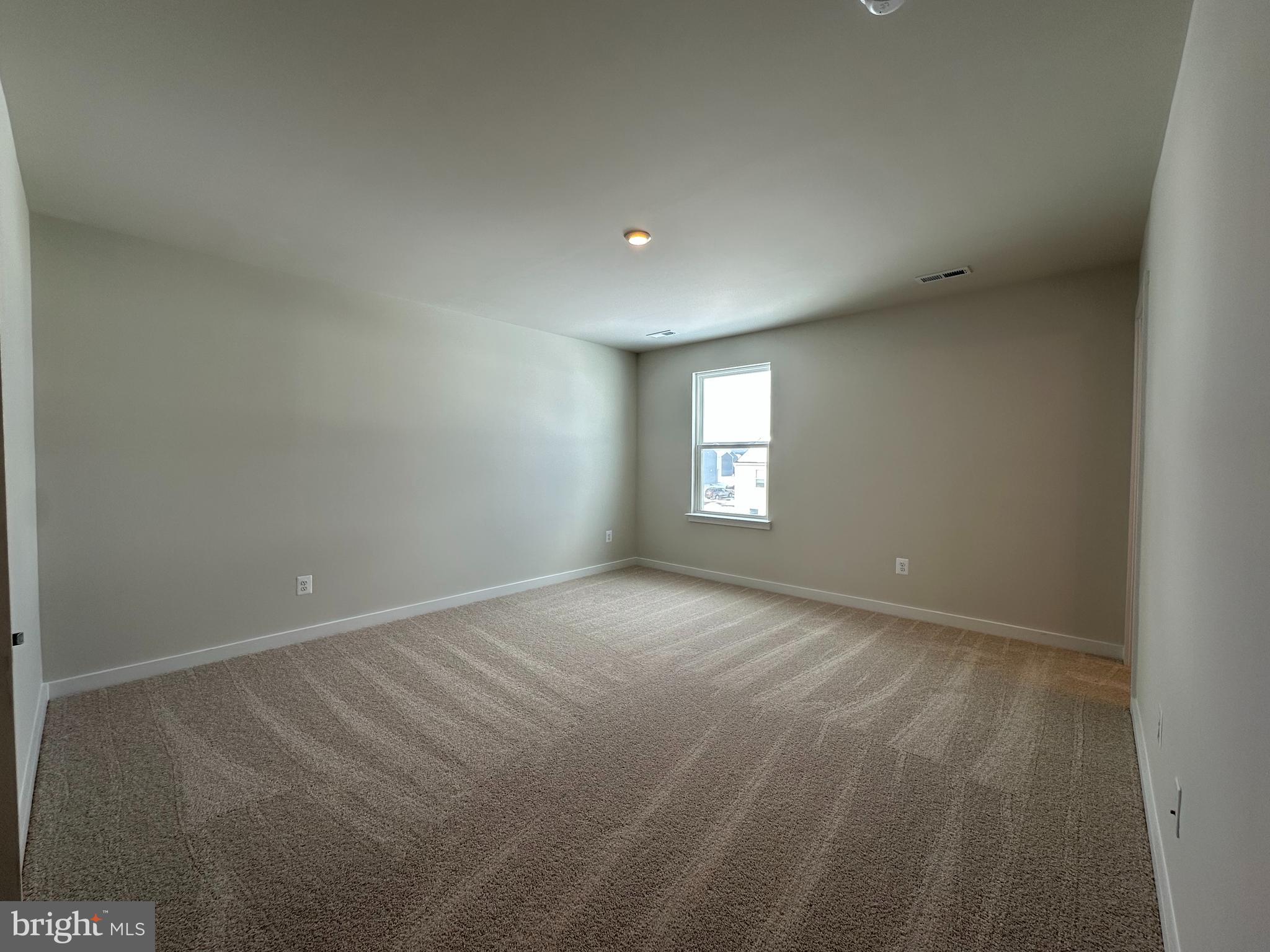 69 Trotting Road Inwood, WV 25428 - Photo 22 of 43 a view of an empty room with a window