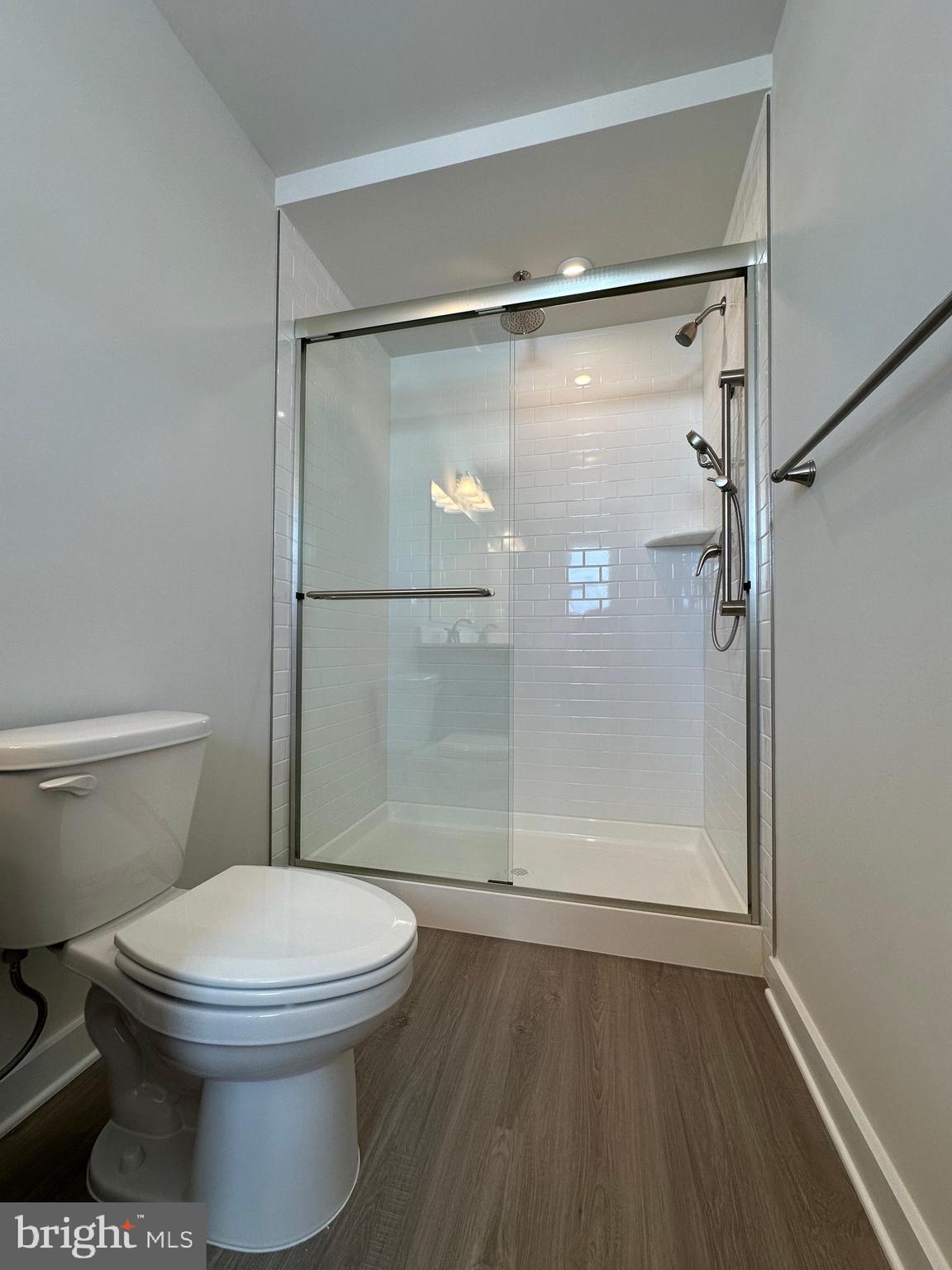 69 Trotting Road Inwood, WV 25428 - Photo 25 of 43 a bathroom with a toilet and a shower