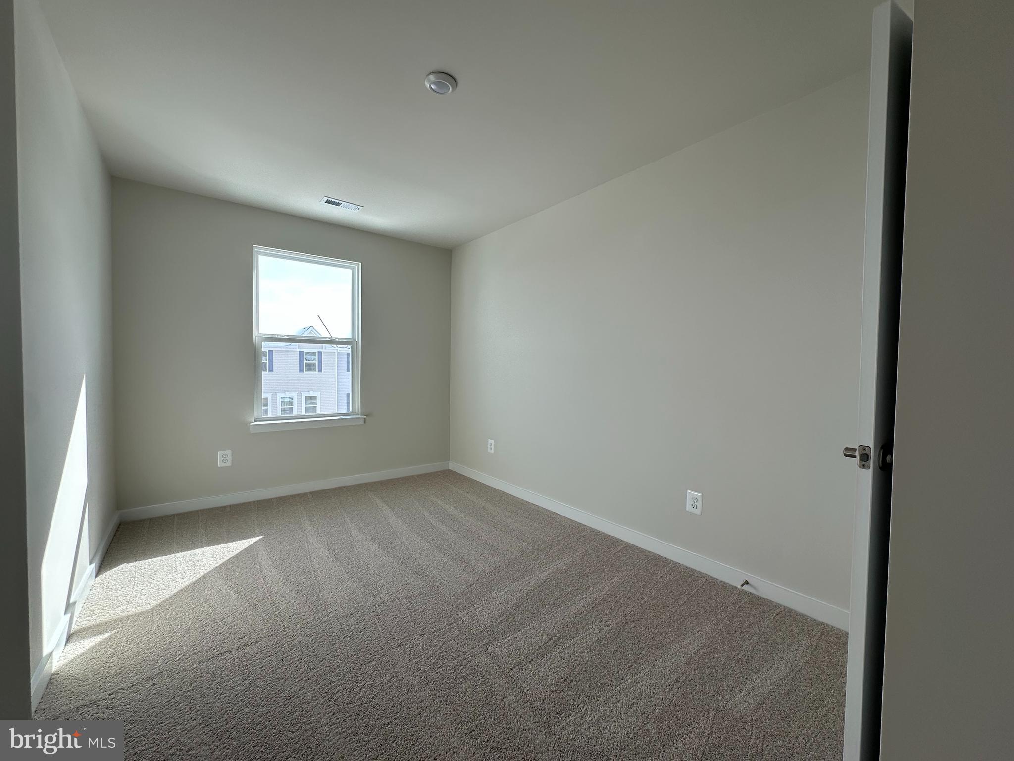 69 Trotting Road Inwood, WV 25428 - Photo 29 of 43 an empty room with windows