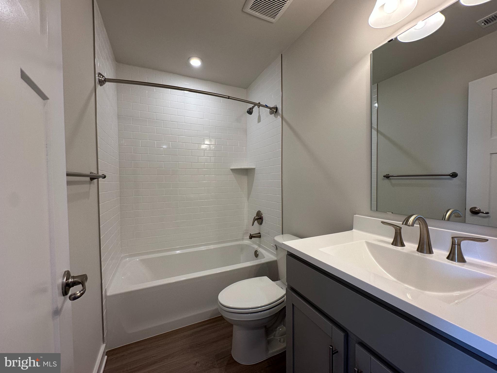 69 Trotting Road Inwood, WV 25428 - Photo 30 of 43 a bathroom with a sink a toilet and shower